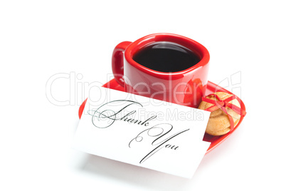 cup with coffee ,thank you card,cake nut and ribbon isolated on