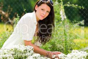 Summer garden beautiful woman care white flowers