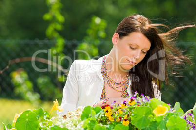 Summer garden beautiful woman care color flowers