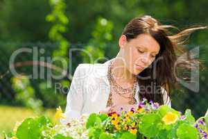 Summer garden beautiful woman care color flowers