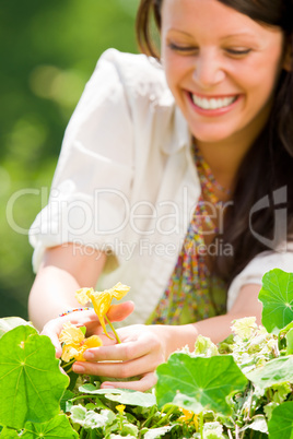 Summer garden beautiful woman smiling care flower