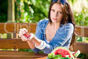 Fresh cherries melon woman garden summer terrace