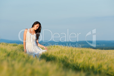Sunset corn field beautiful brunette woman walk Sunset corn field beautiful brunette woman walk