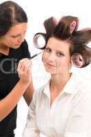 Make-up artist woman fashion model apply eyeshadow