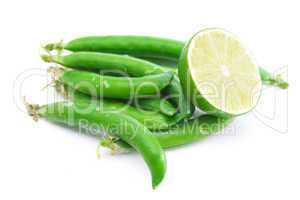 peas and lime isolated on white
