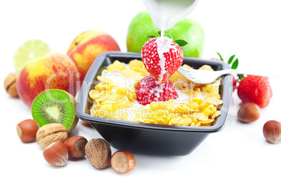 strawberry, peach, nuts,apple, kiwi, milk and flakes in a bowl i