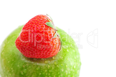 strawberries and apple with water drops tape isolated on white