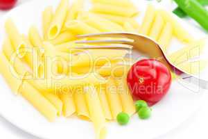 tomatoes, peas, pasta and fork on a plate isolated on white