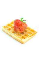 Waffles and strawberries isolated on white