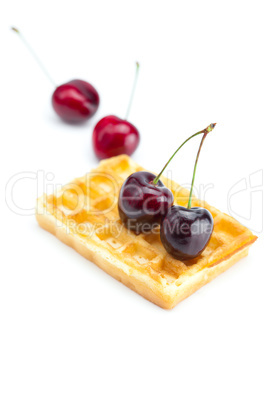 waffles and cherries isolated on white