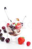 ice cream, cherries, raspberries, strawberries and spoon isolate
