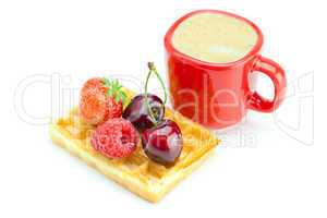 cappuccino cup, waffles, cherries, strawberries and raspberries