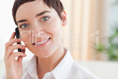 Close up of a woman with a phone