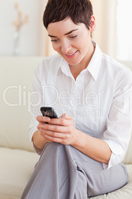 Portrait of a Brunette woman with a cellphone