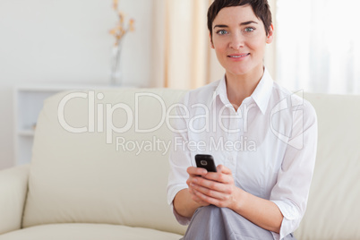 Portrait of a beautiful woman with a cellphone