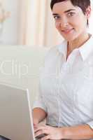 Close up of a woman with a laptop