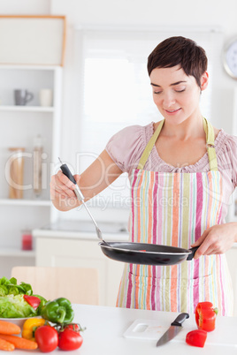 Smiling Woman with a pan