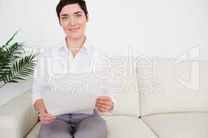 Cute woman with a paper