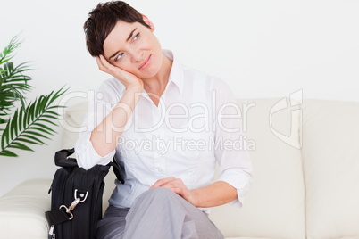 Tired Businesswoman with a bag