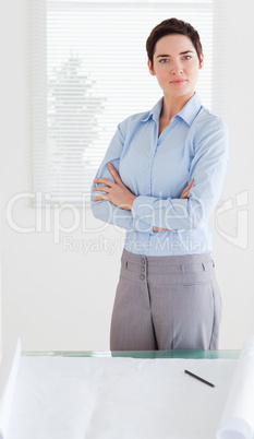Serious businesswoman with a architectural plan