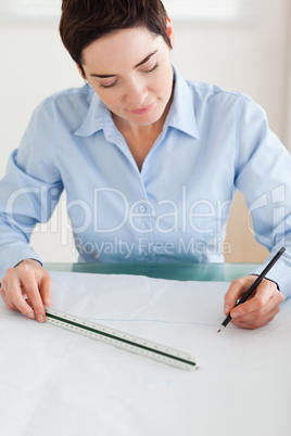 Gorgeous Woman working on an architectural plan