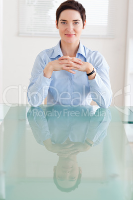 Businesswoman sitting behind a desk