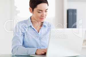 Smiling Businesswoman with a laptop