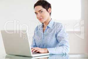 Charming businesswoman with a laptop