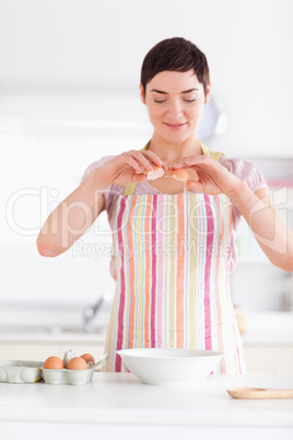 Beautiful woman preparing a cake