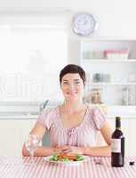 Cute Woman sitting at a table with wine for lunch