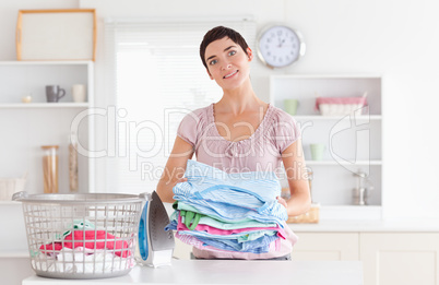 Woman with a pile of clothes