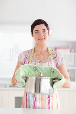 Woman holding a pot