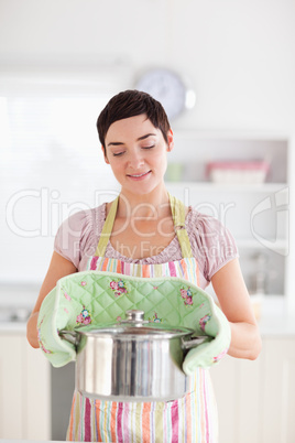 Charming Woman holding a pot