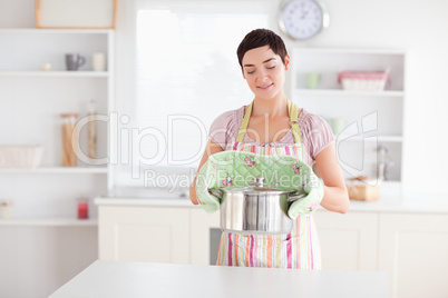 Cute Woman holding a pot