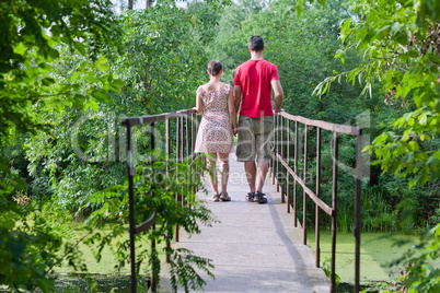 Husband with his wife on the bridge