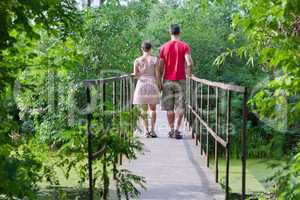 Husband with his wife on the bridge