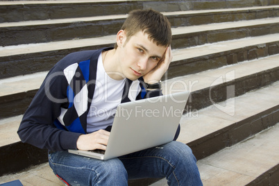 Young student working on a laptop