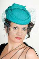 woman in green hat