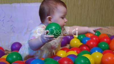 baby playing with plastic ball part 1