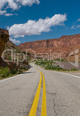 vibrant image of highway and blue sky