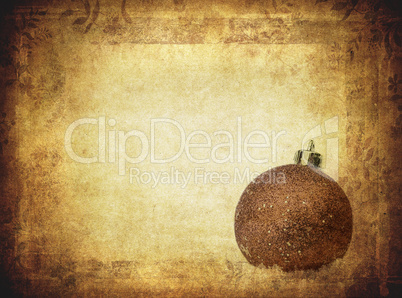 bauble over vintage paper, nice christmas background