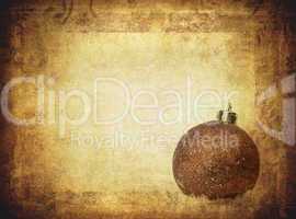 bauble over vintage paper, nice christmas background