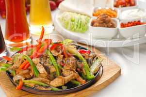 original fajita sizzling hot  on iron plate