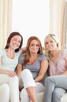 Cute Friends sitting on a sofa