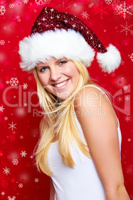 Blonde Frau mit Weihnachtsmütze