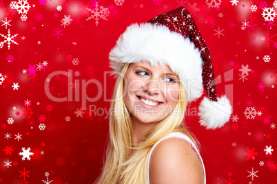 Blonde Frau mit Weihnachtsmütze