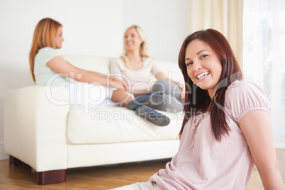 Women chatting on a sofa