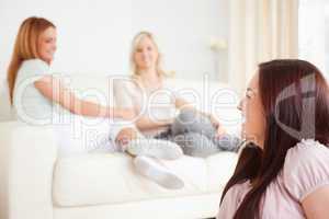 Cute Women chatting on a sofa