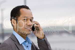 Afro Asian Businessman on the phone