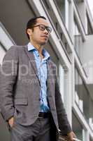 Elegant business man on stairs and handrail